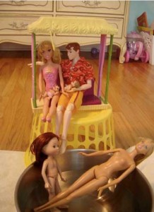 Barbies_babysit_by_the_pool